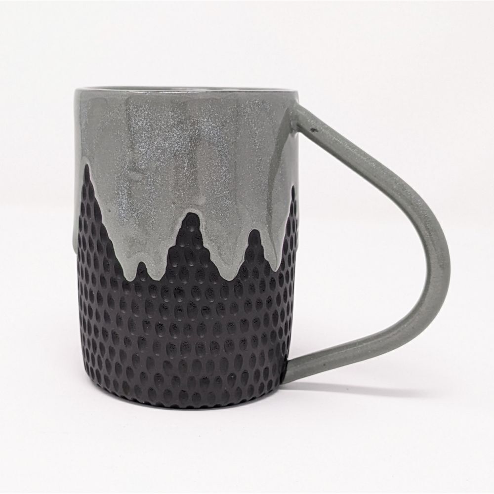 Cieri Fabrication drip mug in sage / black clay body